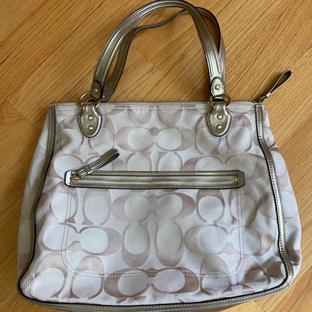 Tan, Gold, and Pink Coach Handbag
